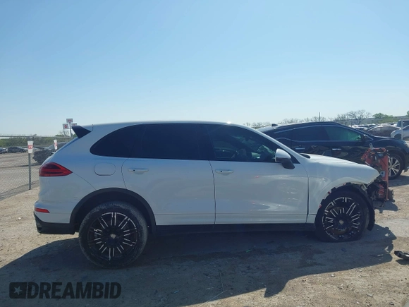 2016 Porsche Cayenne with VIN WP1AA2A29GLA04374, listed as a IAAI auction lot 41988374 with 144,716 mi miles. Bid and sale history available at carsss.com. Image 13.