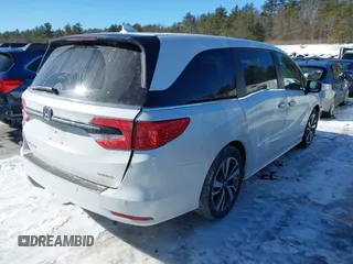 2023 Honda Odyssey Touring with VIN 5FNRL6H81PB008129, listed as a IAAI auction lot 41610714 with 57,273 mi miles and . Bid and sale history available at DreamBid. Image 4.