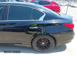 2015 Infiniti Q50 z VIN JN1BV7AP9FM335745, wystawiony jako IAAI lot #42336325 z przebiegiem 153 970 mil mil oraz . Historia ofert i sprzedaży dostępna na DreamBid. Obrazek 13.