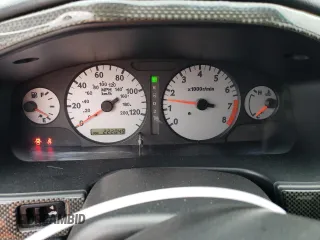 2002 Infiniti G20 Luxury z VIN JNKCP11A52T509703, wystawiony jako Copart lot #56278004 z przebiegiem 222 049 mil mil oraz Szkody całkowita. Historia ofert i sprzedaży dostępna na DreamBid. Obrazek 9.