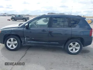 2015 Jeep Compass Sport with VIN 1C4NJDBBXFD151700, listed as a IAAI auction lot 41855482 with 124,822 mi miles. Bid and sale history available at carsss.com. Image 14.