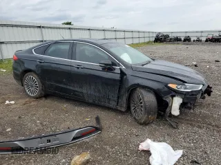 2018 Ford Fusion Titanium с VIN 3FA6P0K91JR183997, выставлен на аукционе Copart как лот 57717235 с пробегом 133 385 миль миль и Списание • Salvage title. История ставок и продаж доступна на DreamBid. Изображение 4.