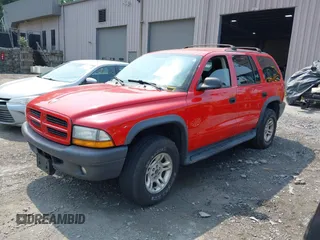 2003 Dodge Durango Sport z VIN 1D4HS38N83F621814, wystawiony jako IAAI lot #42460052 z przebiegiem 128 896 mil mil oraz . Historia ofert i sprzedaży dostępna na DreamBid. Obrazek 2.