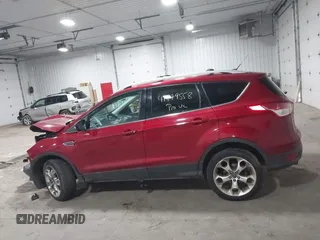 2013 Ford Escape Titanium with VIN 1FMCU9J98DUA72061, listed as a IAAI auction lot 41979558 with 176,667 mi miles and . Bid and sale history available at DreamBid. Image 14.