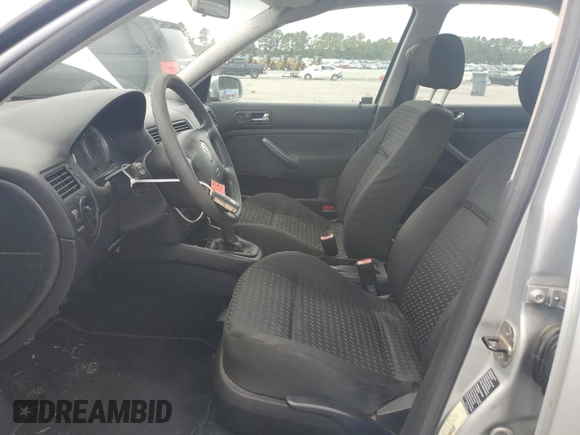 2004 Volkswagen Jetta GL with VIN 3VWRR69M34M108439, listed as a Copart auction lot 74029704 with 296,984 mi miles and Salvage title. Bid and sale history available at DreamBid. Image 7.