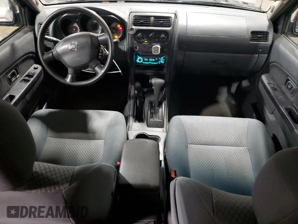 2004 Nissan Xterra XE with VIN 5N1ED28YX4C650888, listed as a Copart auction lot 57151695 with 142,210 mi miles and Salvage title. Bid and sale history available at DreamBid. Image 8.