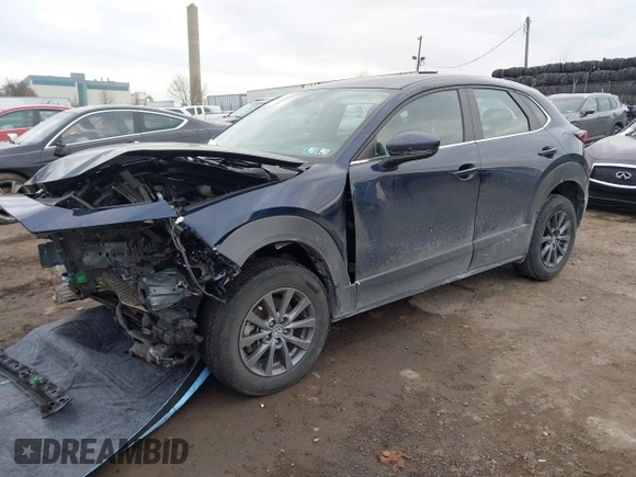 2022 Mazda CX-30 S with VIN 3MVDMBAL8NM411739, listed as a IAAI auction lot 41668265 with 34,964 mi miles and . Bid and sale history available at carsss.com. Image 16.