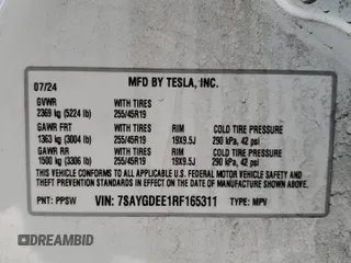 2024 Tesla Model Y Long Range with VIN 7SAYGDEE1RF165311, listed as a Copart auction lot 51711665 with 15,190 mi miles and Salvage Title. Bid and sale history available at DreamBid. Image 14.