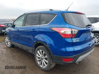 2017 Ford Escape Titanium with VIN 1FMCU9JD8HUA59000, listed as a IAAI auction lot 41559788 with 90,319 mi miles. Bid and sale history available at carsss.com. Image 3.