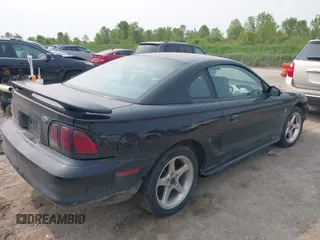 1998 Ford Mustang with VIN 1FAFP4048WF206663, listed as a IAAI auction lot 42417476 with 150,665 mi miles and . Bid and sale history available at DreamBid. Image 4.