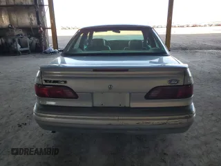 1995 Ford Taurus GL z VIN 1FALP524XSG154141, wystawiony jako Copart lot #77271544 z przebiegiem 72 118 mil mil oraz Czysty tytuł • Clean title. Historia ofert i sprzedaży dostępna na DreamBid. Obrazek 6.