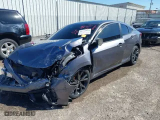 2021 Honda Civic Sedan Sport with VIN 19XFC2F81ME000807, listed as a IAAI auction lot 41742824 with 139,752 mi miles. Bid and sale history available at carsss.com. Image 2.