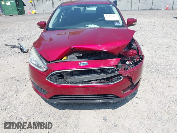 2017 Ford Focus SE z VIN 1FADP3F26HL305624, wystawiony jako IAAI lot #42411111 z przebiegiem 58 865 mil mil oraz . Historia ofert i sprzedaży dostępna na DreamBid. Obrazek 6.