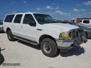 2000 Ford Excursion XLT with VIN 1FMSU41F0YEC90872, listed as a Copart auction lot 77243644 with 90,302 mi miles and Salvage Title. Bid and sale history available at carsss.com. Image 4.