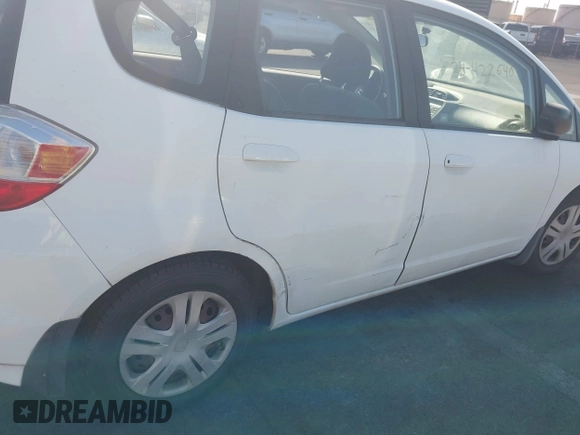 2010 Honda Fit with VIN JHMGE8H25AC029528, listed as a IAAI auction lot 41084208 with 58,774 mi miles. Bid and sale history available at carsss.com. Image 6.