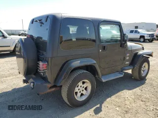 2004 Jeep Wrangler Sahara with VIN 1J4FA59SX4P718591, listed as a Copart auction lot 59907805 with 241,994 mi miles and Clean title. Bid and sale history available at DreamBid. Image 3.