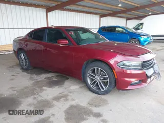 2019 Dodge Charger SXT with VIN 2C3CDXJG0KH757909, listed as a IAAI auction lot 41597907 with 71,882 mi miles and . Bid and sale history available at DreamBid. Image 1.