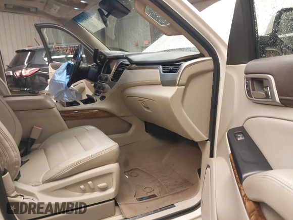 2015 GMC Yukon XL Denali with VIN 1GKS2JKJ1FR635901, listed as a IAAI auction lot 41805739 with 120,998 mi miles and . Bid and sale history available at carsss.com. Image 5.