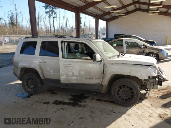 2015 Jeep Patriot Limited with VIN 1C4NJRCB9FD177233, listed as a IAAI auction lot 41443612 with 149,096 mi miles and . Bid and sale history available at DreamBid. Image 14.