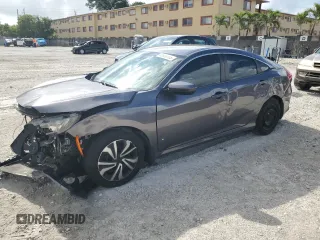 2017 Honda Civic LX z VIN 19XFC2F56HE040408, wystawiony jako Copart lot #55920755 z przebiegiem 136 797 mil mil oraz Szkoda całkowita • Salvage title. Historia ofert i sprzedaży dostępna na DreamBid. Obrazek 1.