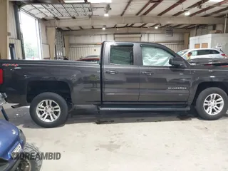 2016 Chevrolet Silverado 1500 LT with VIN 1GCVKREH3GZ137734, listed as a IAAI auction lot 41975379 with 108,704 mi miles and . Bid and sale history available at DreamBid. Image 4.