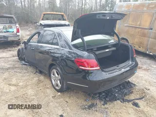 2014 Mercedes-Benz E E 350 Sport with VIN WDDHF5KBXEA994970, listed as a IAAI auction lot 41973386 with Not Provided miles. Bid and sale history available at carsss.com. Image 3.
