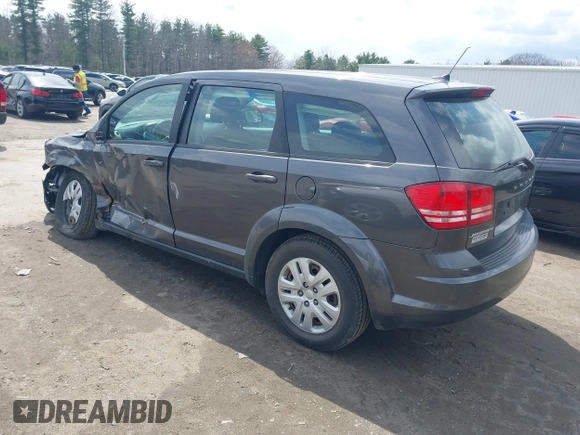 2014 Dodge Journey SE with VIN 3C4PDCABXET219532, listed as a IAAI auction lot 42030341 with 139,145 mi miles and . Bid and sale history available at carsss.com. Image 3.