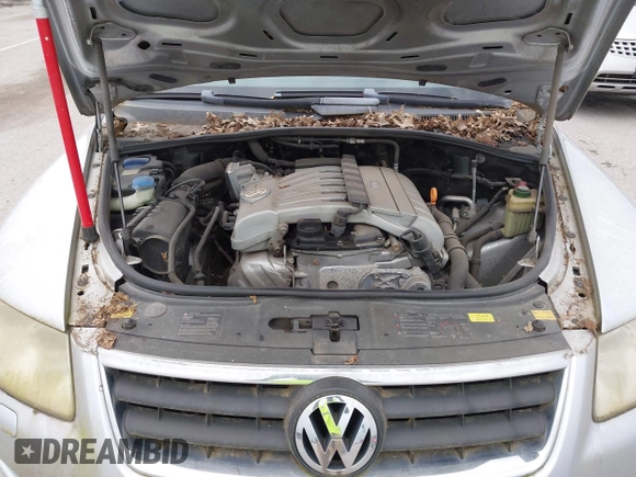 2007 Volkswagen Touareg V6 z VIN WVGZE77L57D001046, wystawiony jako IAAI lot #42283224 z przebiegiem 243 861 mil mil oraz . Historia ofert i sprzedaży dostępna na DreamBid. Obrazek 10.