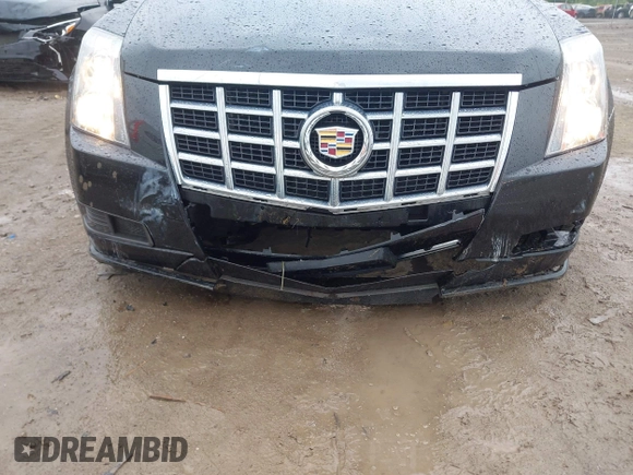 2013 Cadillac CTS Luxury z VIN 1G6DG5E50D0121280, wystawiony jako IAAI lot #42439031 z przebiegiem 75 211 mil mil oraz . Historia ofert i sprzedaży dostępna na DreamBid. Obrazek 6.