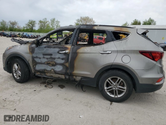 2017 Hyundai Santa Fe 2.4L z VIN 5NMZUDLB0HH042101, wystawiony jako Copart lot #55058145 z przebiegiem Nie podano mil oraz Szkoda całkowita • Salvage title. Historia ofert i sprzedaży dostępna na DreamBid. Obrazek 2.