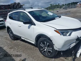 2017 Toyota RAV4 LE z VIN JTMBFREV8HJ700774, wystawiony jako IAAI lot #42439345 z przebiegiem 96 907 mil mil oraz . Historia ofert i sprzedaży dostępna na DreamBid. Obrazek 1.