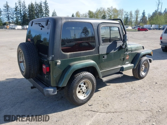 1997 Jeep Wrangler Sahara with VIN 1J4FY49S4VP523156, listed as a IAAI auction lot 42046797 with 193,408 mi miles. Bid and sale history available at carsss.com. Image 4.