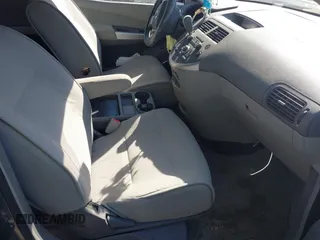 2008 Nissan Quest S with VIN 5N1BV28U68N108792, listed as a IAAI auction lot 41696473 with 141,390 mi miles. Bid and sale history available at carsss.com. Image 5.