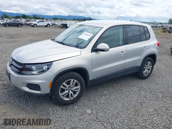 2013 Volkswagen Tiguan SEL with VIN WVGBV3AX1DW571843, listed as a IAAI auction lot 42540191 with 140,639 mi miles and . Bid and sale history available at DreamBid. Image 2.