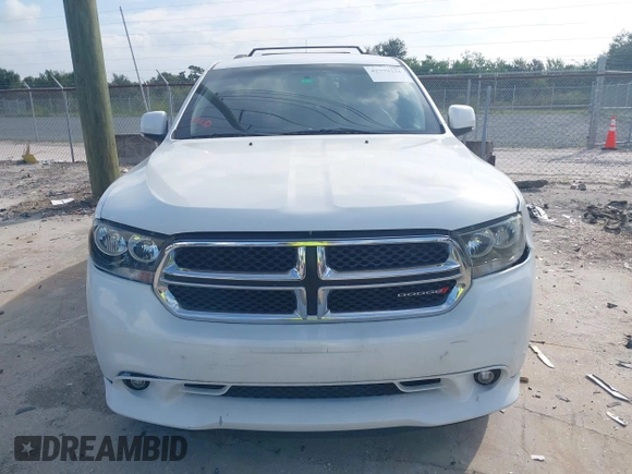2013 Dodge Durango Crew with VIN 1C4RDHDGXDC608209, listed as a IAAI auction lot 42779231 with 203,460 mi miles and . Bid and sale history available at DreamBid. Image 12.