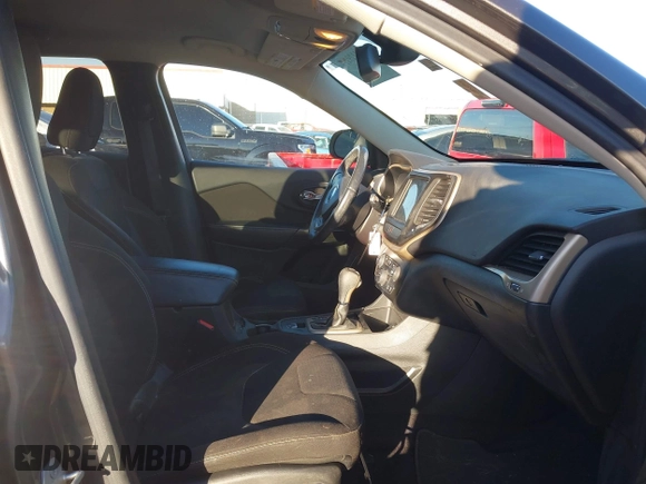 2016 Jeep Cherokee Altitude with VIN 1C4PJLCS8GW173279, listed as a IAAI auction lot 41129117 with 163,978 mi miles. Bid and sale history available at carsss.com. Image 5.