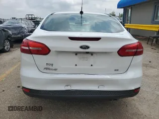 2018 Ford Focus SE с VIN 1FADP3F23JL201582, выставлен на аукционе Copart как лот 54722395 с пробегом 95 710 миль миль и Списание • Salvage title. История ставок и продаж доступна на DreamBid. Изображение 6.