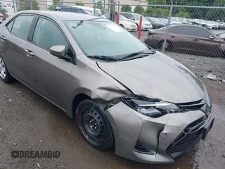2018 Toyota Corolla L with VIN 2T1BURHE9JC990834, listed as a IAAI auction lot 42583027 with 217,143 mi miles and . Bid and sale history available at DreamBid. Image 6.