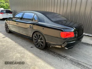 2014 Bentley Flying Spur с VIN SCBEC9ZA4EC094924, выставлен на аукционе Copart как лот 61729205 с пробегом 31 529 миль миль и Списание • Salvage title. История ставок и продаж доступна на DreamBid. Изображение 3.