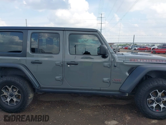 2020 Jeep Wrangler Unlimited Rubicon z VIN 1C4HJXFG7LW193665, wystawiony jako IAAI lot #41874930 z przebiegiem 58 884 mil mil oraz . Historia ofert i sprzedaży dostępna na DreamBid. Obrazek 13.