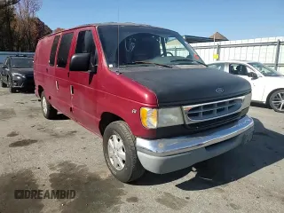 1999 Ford Econoline Cargo with VIN 1FDRE14W1XHB36383, listed as a Copart auction lot 77230084 with 222,420 mi miles and Salvage Title. Bid and sale history available at carsss.com. Image 12.