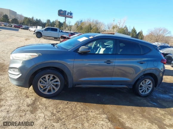 2016 Hyundai Tucson SE with VIN KM8J33A45GU089996, listed as a IAAI auction lot 41687069 with 129,957 mi miles. Bid and sale history available at carsss.com. Image 14.