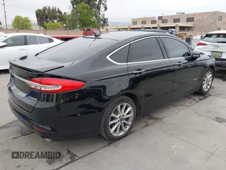 2017 Ford Fusion Titanium with VIN 3FA6P0SUXHR110304, listed as a IAAI auction lot 42119565 with 118,706 mi miles and . Bid and sale history available at DreamBid. Image 4.