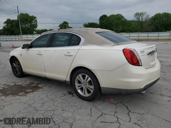 2009 Lincoln MKS with VIN 1LNHM93R89G603297, listed as a Copart auction lot 55474585 with 111,760 mi miles and Salvage title. Bid and sale history available at DreamBid. Image 2.