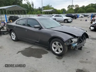 2014 Dodge Charger SXT z VIN 2C3CDXHGXEH261414, wystawiony jako Copart lot #55871705 z przebiegiem 221 000 mil mil oraz Szkoda całkowita • Salvage title. Historia ofert i sprzedaży dostępna na DreamBid. Obrazek 4.