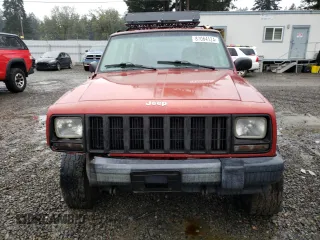 1999 Jeep Cherokee SE with VIN 1J4FF28S9XL645291, listed as a Copart auction lot 87064124 with Not provided miles and Salvage title. Bid and sale history available at DreamBid. Image 5.