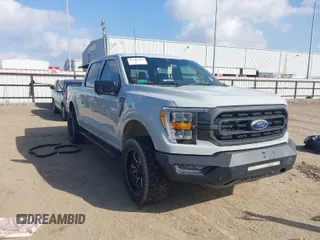 2023 Ford F-150 XL with VIN 1FTFW1E84PFA28761, listed as a IAAI auction lot 41532863 with 32,929 mi miles. Bid and sale history available at carsss.com. Image 1.