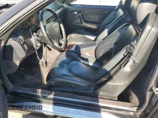 1999 Mercedes-Benz SL-Class with VIN WDBFA68F1XF184891, listed as a Copart auction lot 77082284 with 96,379 mi miles and Salvage Title. Bid and sale history available at carsss.com. Image 7.