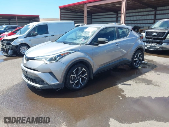 2018 Toyota C-HR XLE z VIN NMTKHMBX5JR009504, wystawiony jako IAAI lot #41776136 z przebiegiem 63 795 mil mil oraz . Historia ofert i sprzedaży dostępna na DreamBid. Obrazek 18.