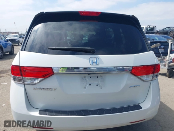 2016 Honda Odyssey SE with VIN 5FNRL5H33GB043303, listed as a IAAI auction lot 42215233 with 67,097 mi miles and . Bid and sale history available at DreamBid. Image 16.